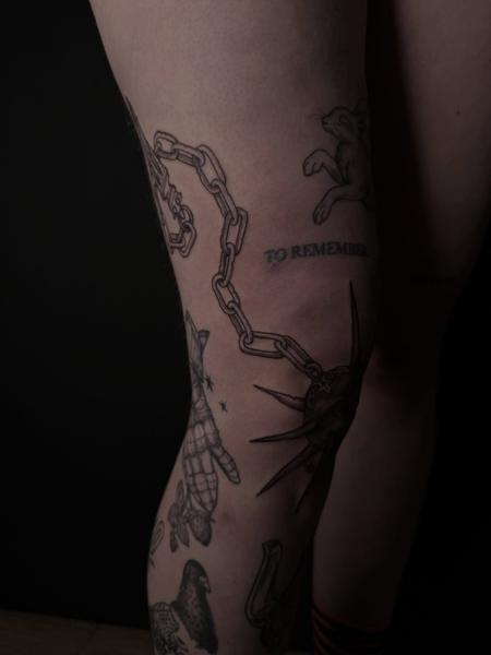 Blackwork chain and grenade tattoo by @creepycrawlertattoo