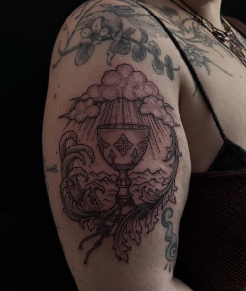 Linework chalice and waves tattoo by @creepycrawlertattoo