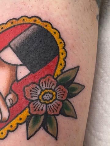Traditional traditional heart flower tattoo by @ctptattoo