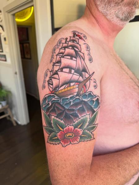 Traditional sailing ship tattoo by @ctptattoo