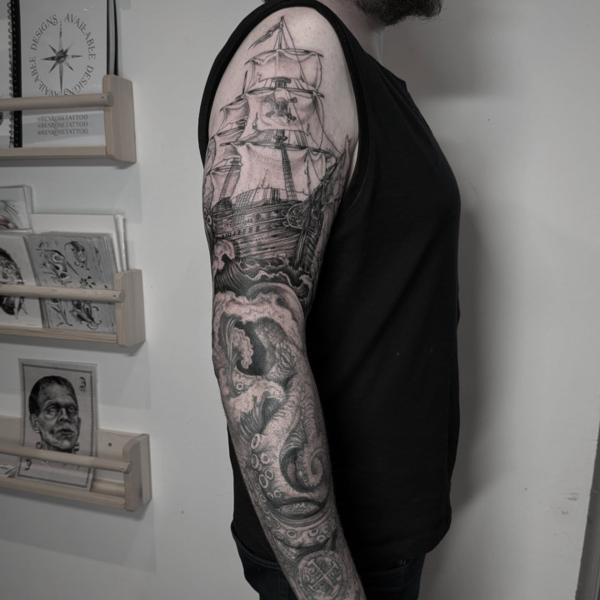 Realism pirate ship kraken tattoo by @daisy_tattooing