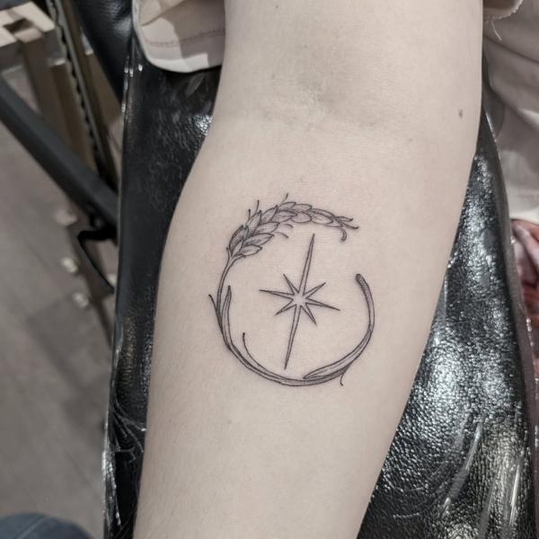 Fine line wheat star tattoo by @daisy_tattooing