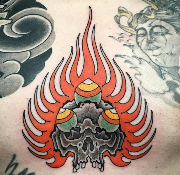 Traditional flaming skull tattoo by @ilovetattooing