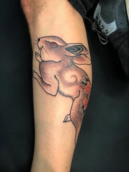 Illustrative floral rabbit tattoo by @ilovetattooing