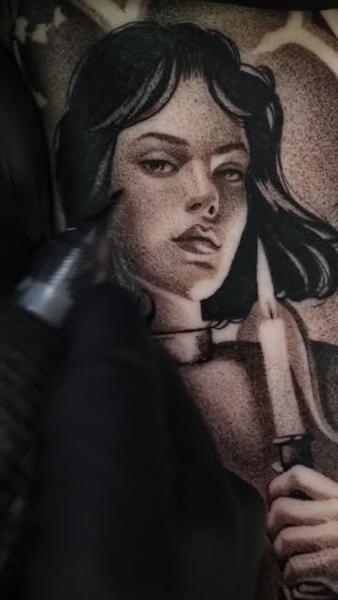 Realism woman with candle tattoo by @danijtattoo