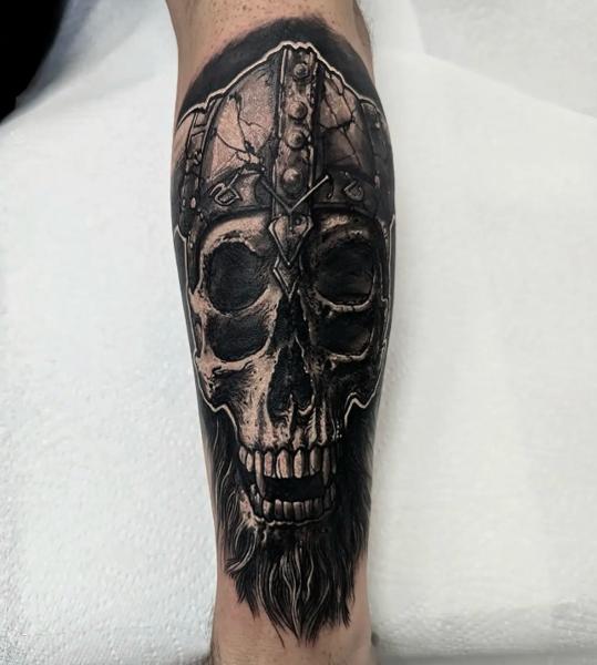 Realism viking skull tattoo by @danny_tattooart