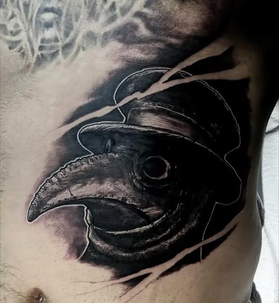 Realism plague doctor tattoo by @danny_tattooart
