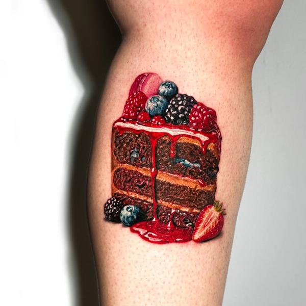 Realism berry cake slice tattoo by @daria_inkaholic