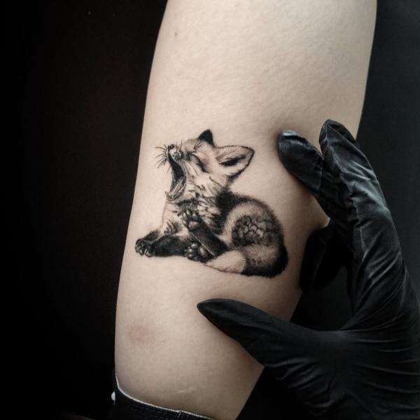 Realism yawning fox tattoo by @daria_inkaholic