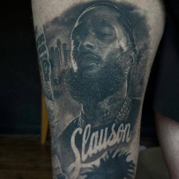 Realism portrait with text tattoo by @mrbaldaro