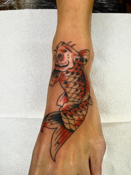 Traditional koi fish tattoo by @davidhtattoo
