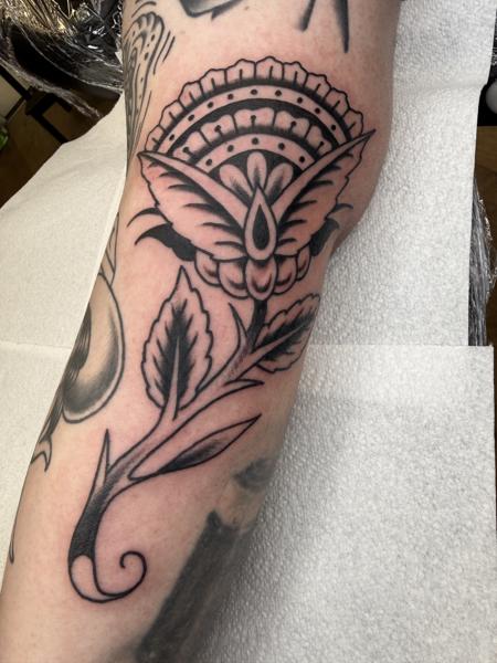 Traditional floral moth tattoo by @davidhtattoo