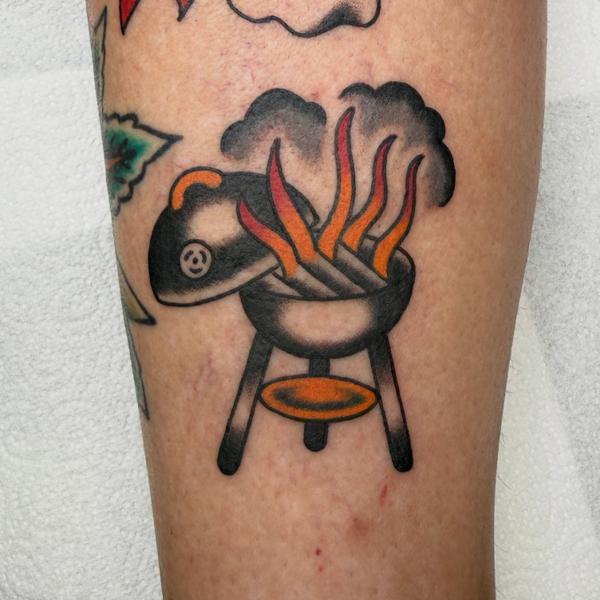 Traditional grill flames tattoo by @davidhtattoo