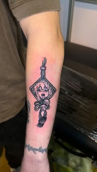 Linework hanging doll tattoo by @monkhousetattoos