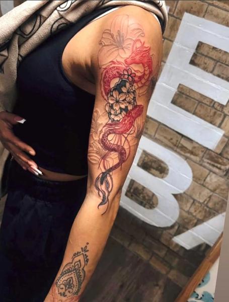 Japanese floral dragon tattoo by @d_chakki