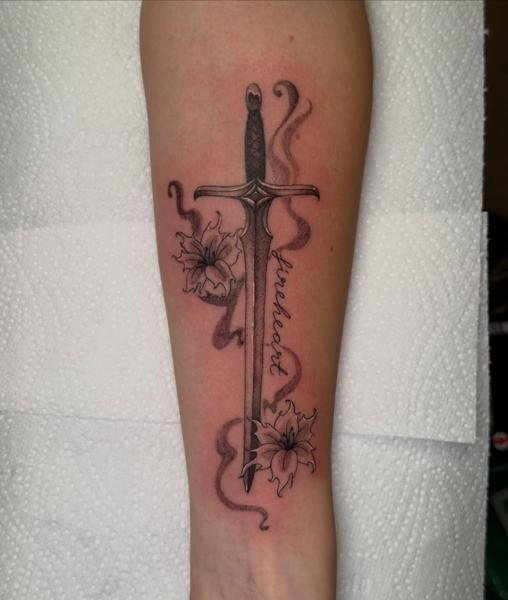 Fine Line sword with flowers tattoo by @delitetattoo