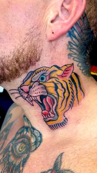 Traditional roaring tiger head tattoo by @derrythtattoos