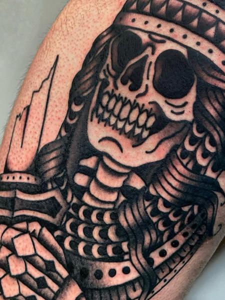 Traditional warrior skull tattoo by @theblackrabbit_tattoostudio