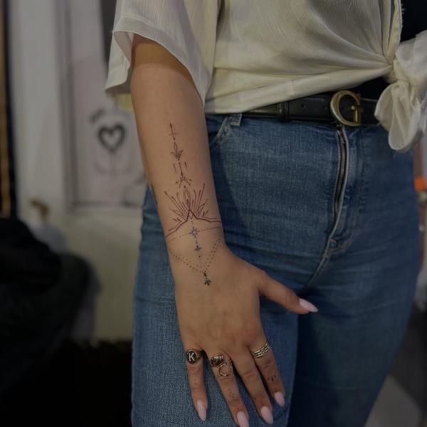Fine line ornamental lotus tattoo by @dimel_tattooer