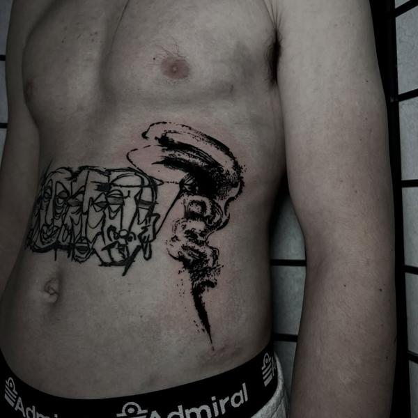 Blackwork abstract faces tattoo by @bdt_tattoos