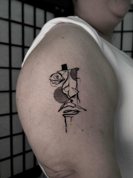 Abstract blackwork abstract face rose tattoo by @bdt_tattoos