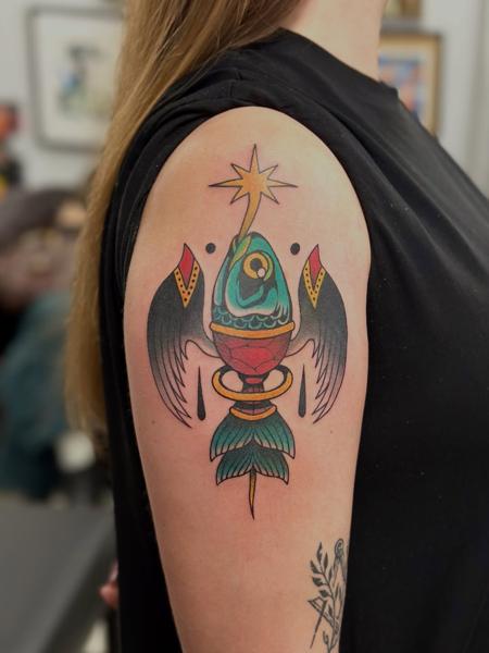 Traditional abstract bird tattoo by @fitz.ttt
