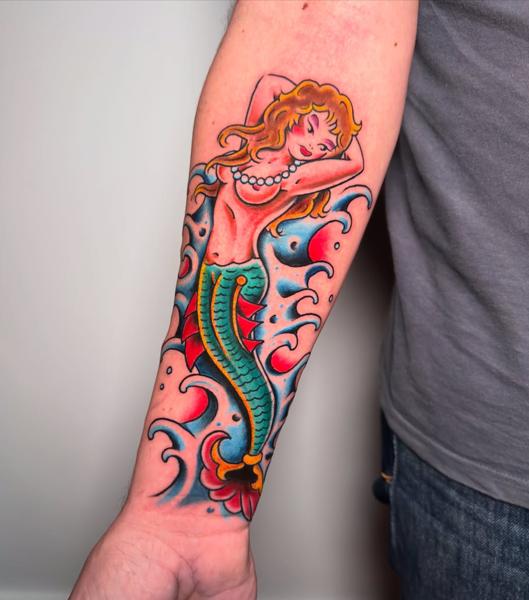 Traditional traditional mermaid tattoo by @dimitris_v_tattooer