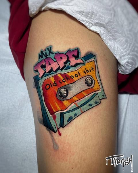 Traditional cassette tape tattoo by @dimos_thrash_tattoo