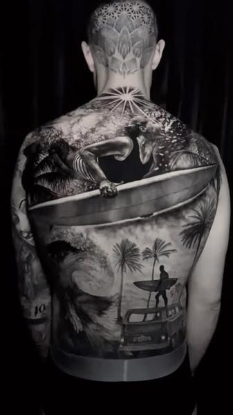 Realism surfing scene tattoo by @dinos.mts