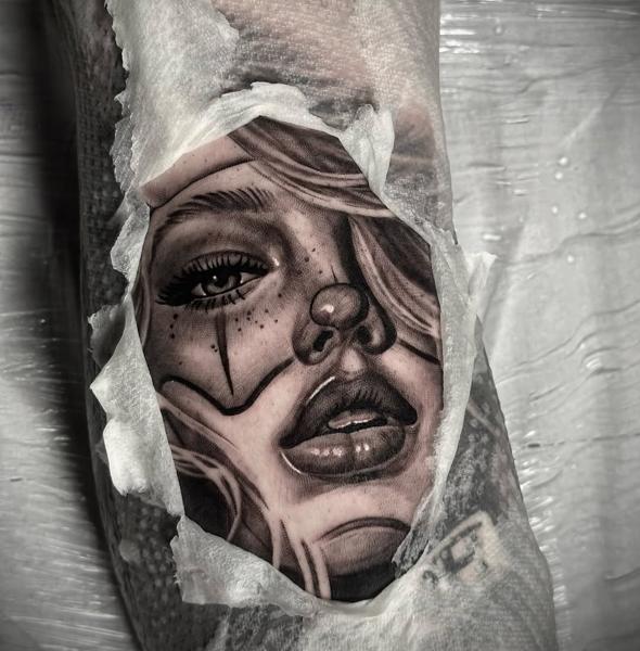 Realism clown woman tattoo by @dinos.mts