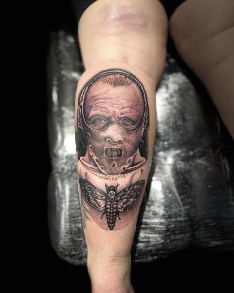 Realism masked character tattoo by @divineeyetattoo