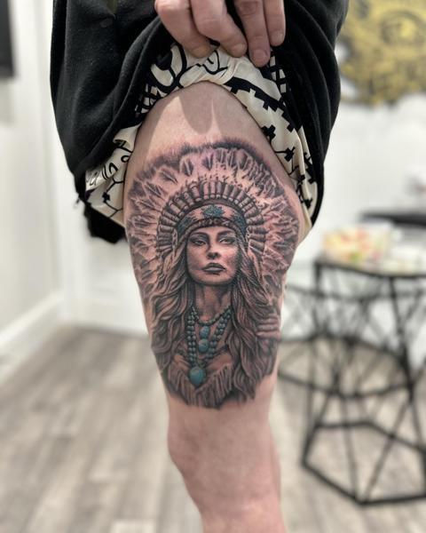Realism woman in headdress tattoo by @divineeyetattoo