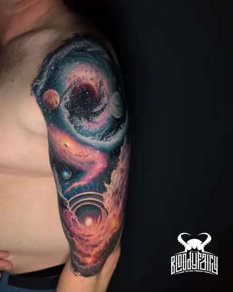 Realism galaxy scene tattoo by @dostattoo_marios