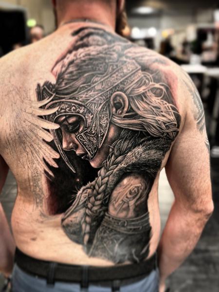 Realism warrior portrait tattoo by @doublexxtattoo