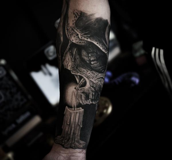 Realism skull and candle tattoo by @doublexxtattoo