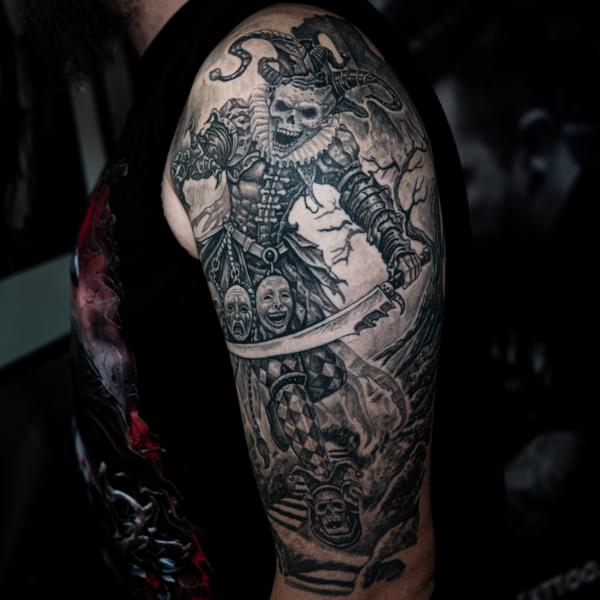 Realism jester skeleton tattoo by @doublexxtattoo
