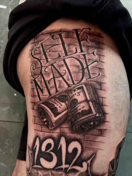 Realism money rolls tattoo by @_drag.tats