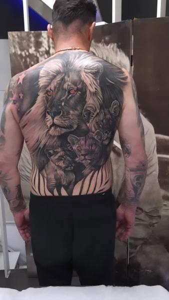 Realism lion family tattoo by @dreamtattooathens