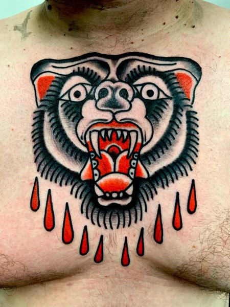 Traditional bear head tattoo by @edstaplestattooer
