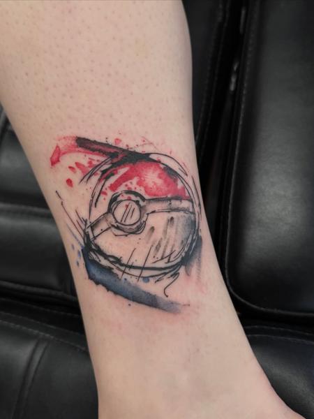 Watercolor pokeball tattoo by @tease_84