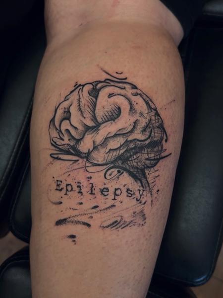 Illustrative brain illustration tattoo by @tease_84