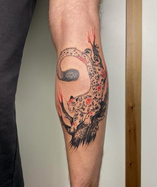 Illustrative patterned leopard tattoo by @electrabuzz._