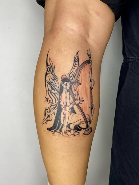 Illustrative harp player tattoo by @electrabuzz._