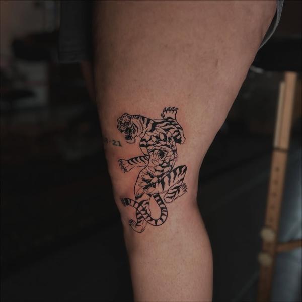 Linework floral tiger tattoo by @jelene_tattoo