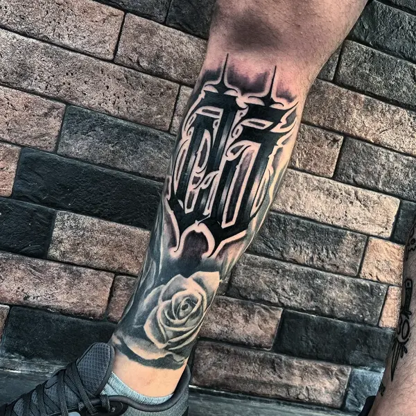 Blackwork lettering and rose tattoo by @eliotdivision