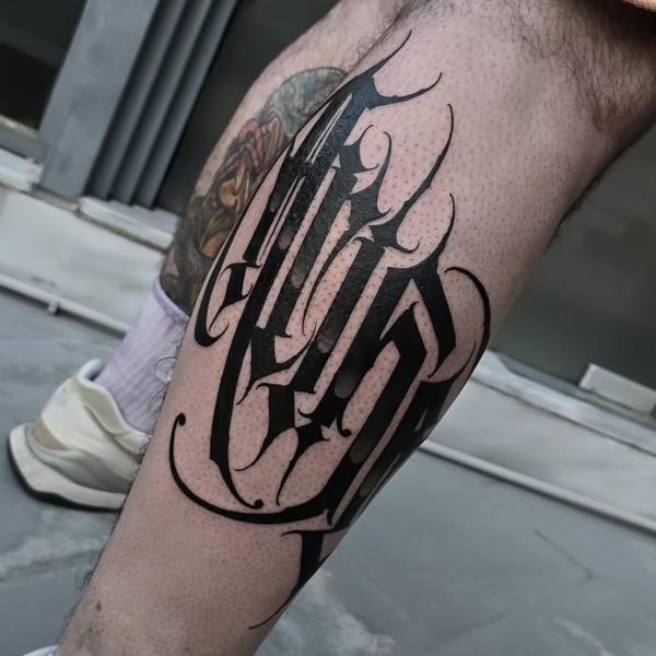 Lettering gothic script tattoo by @eliotdivision