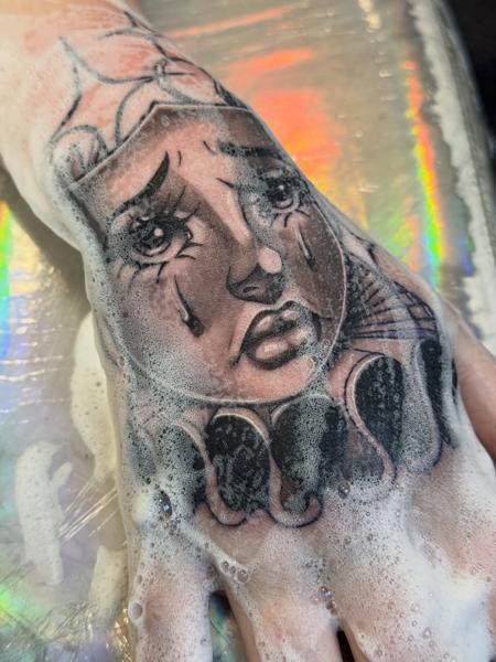 Blackwork crying character tattoo by @ellecartelle