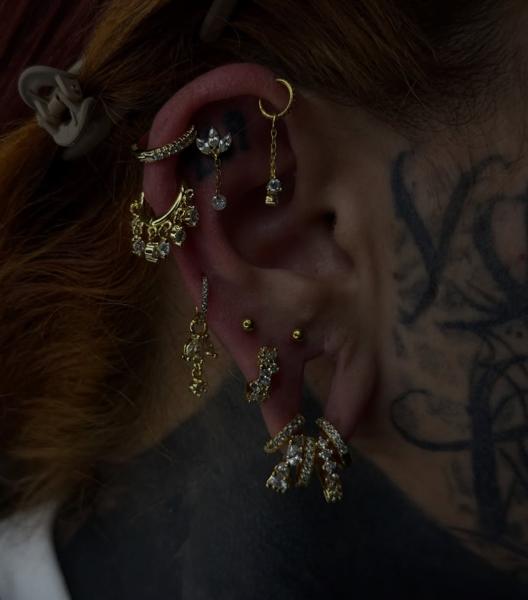 Blackwork ear script tattoo by @ellecartelle