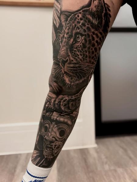 Realism leopard and mask tattoo by @elle_ink_
