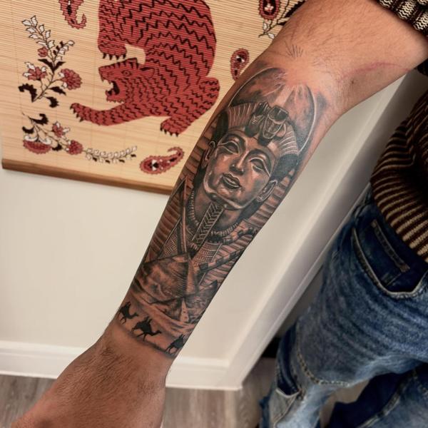 Realism pharaoh and pyramids tattoo by @elle_ink_